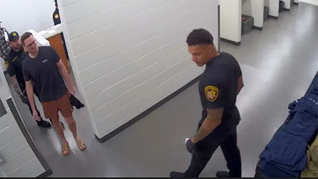 Surgeon Accused of Double Murder Calm as He Enters Jail