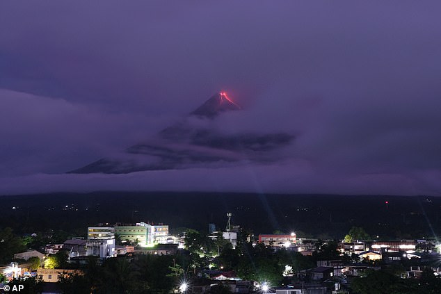 Green fireball and lava illuminate Mount Mayon eruption skies